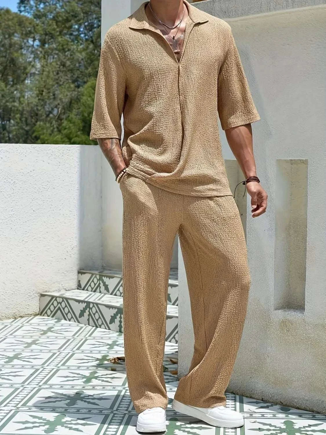 Men's Johnny Collar Half Sleeve Top and Pants SetFeatures: Basic style
Number of pieces: Two-piece
Stretch: Slightly stretchy
Material composition: 80% polyester, 20% spandex
Care instructions: Machine wash cold. T2TrendsiRK TRENDING STYLE Men's Johnny Collar