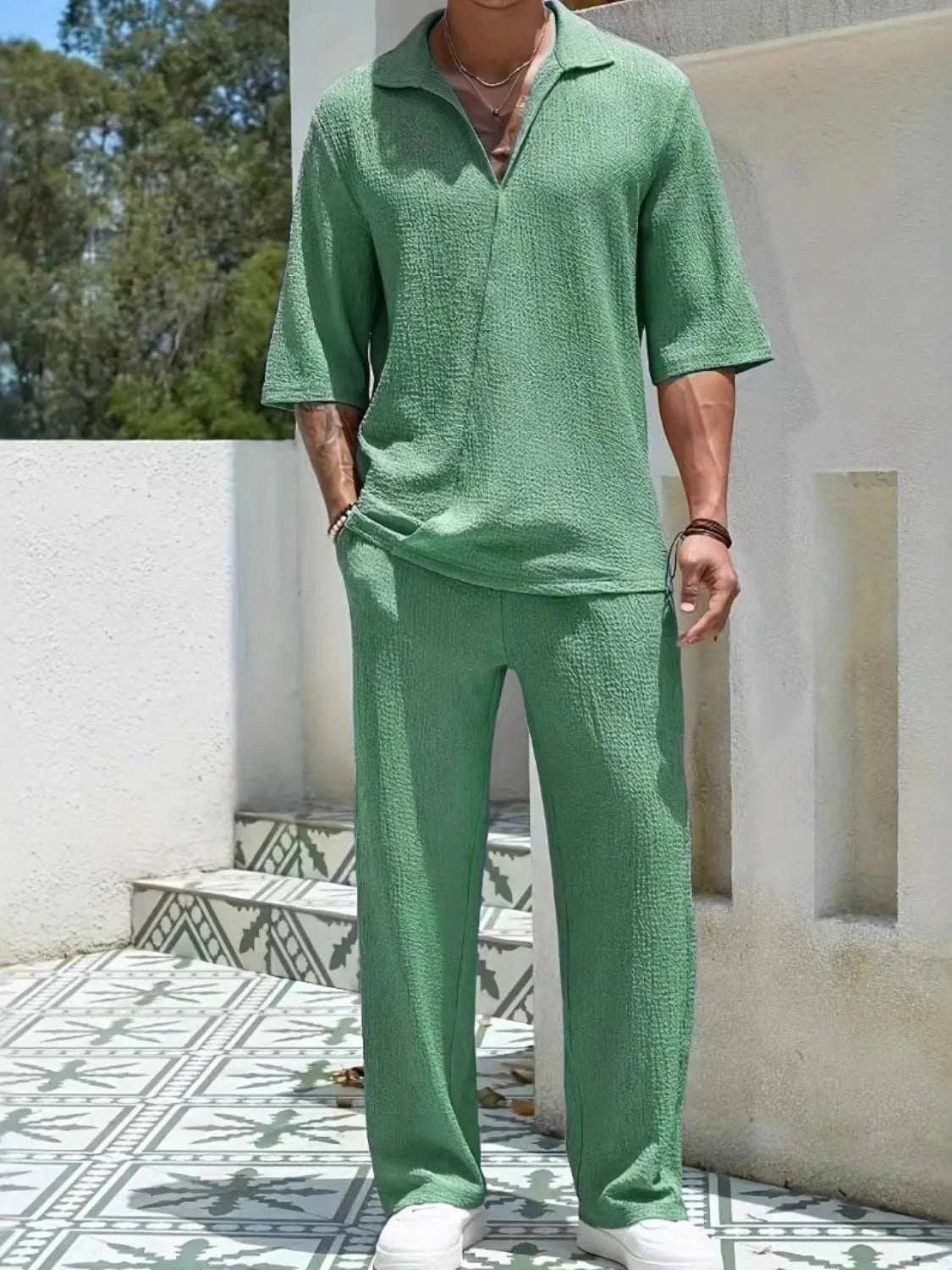 Men's Johnny Collar Half Sleeve Top and Pants SetFeatures: Basic style
Number of pieces: Two-piece
Stretch: Slightly stretchy
Material composition: 80% polyester, 20% spandex
Care instructions: Machine wash cold. T2TrendsiRK TRENDING STYLE Men's Johnny Collar