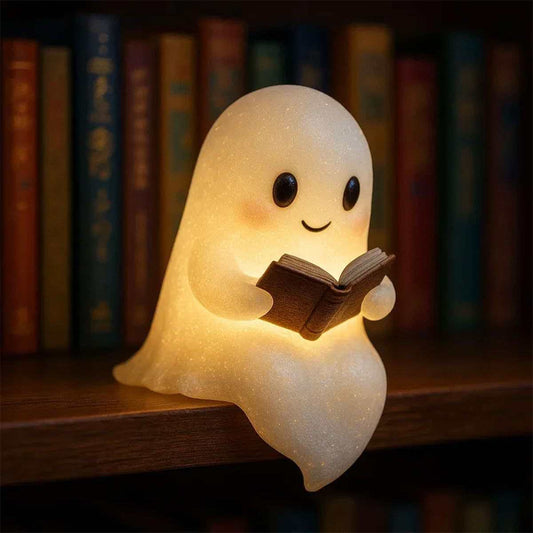 Adorable LED ghost night light reading a book, perfect for children's rooms and Halloween decor.